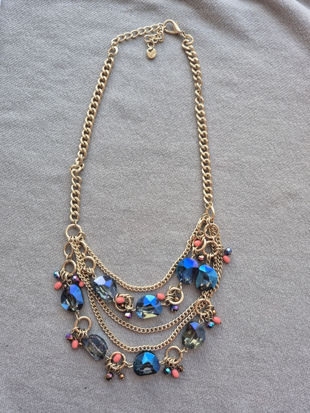 Gold-Tone Multi Strand Necklace with Blue Crystal Drops